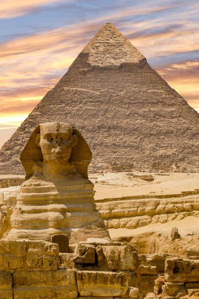 istock Stunning sunset and the Egyptian Sphinx in Giza, Egypt. 1578561254