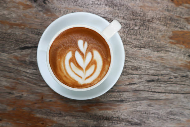 istock hot cofffee, cappuccino coffee or latte coffee or flat white or latte art 1578561297