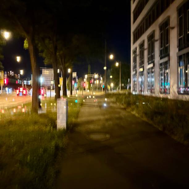 istock Blured city lights at night in Stuttgart, Germany 1578570838
