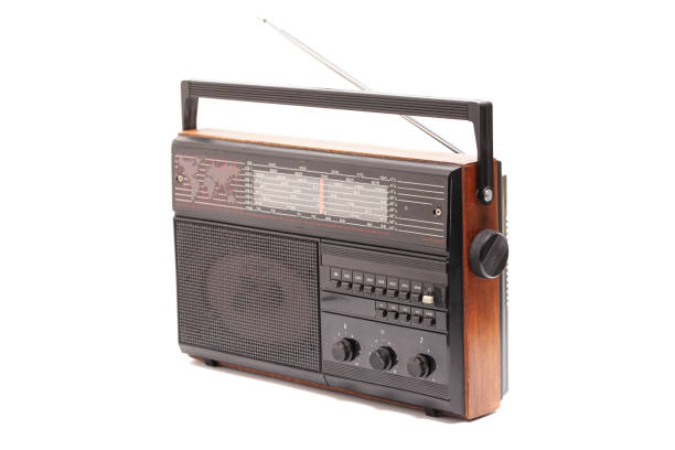 istock Old transistor radio isolated on white. 1578606268