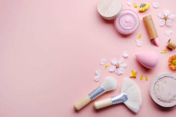 istock Beauty products with flowers on pink background 1578608885