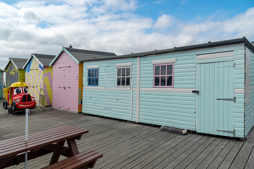 Beach huts on the pier in Southend, England, UK.  Southend has the longest entertainment pier in the world.