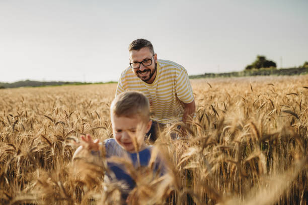 istock Father and son spending time together on a field 1578685750