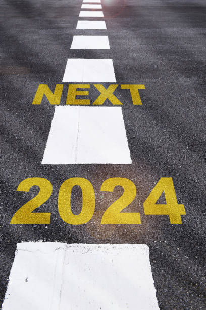 istock Next word written on asphalt road with white marking lines 1578712249