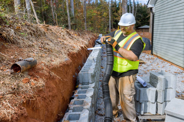 istock Construction worker of laying drainage pipe for rainwater 1578731761