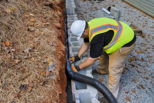 istock Construction project on proper installation of a drainage pipe for rainwater in retaining wall. 1578731791
