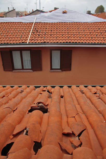 istock Hail: damaged roofs and broken tiles in Cislago, Lombardy 1578733504