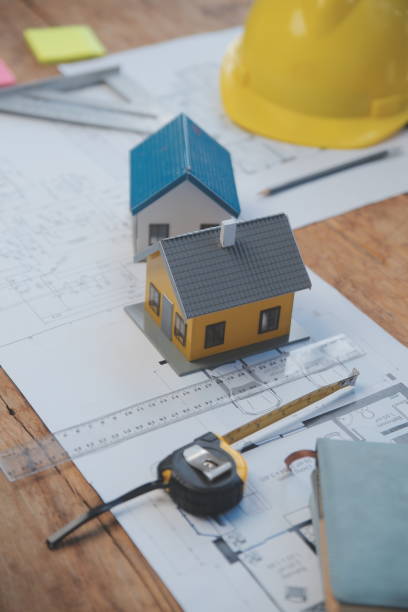 istock Engineer Teamwork Meeting, Drawing working on blueprint meeting for project working with partner on model building and engineering tools in working site, Construction and structure concept. 1578789380