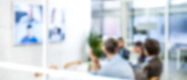 istock Blurred shot of a video conference 1578812854