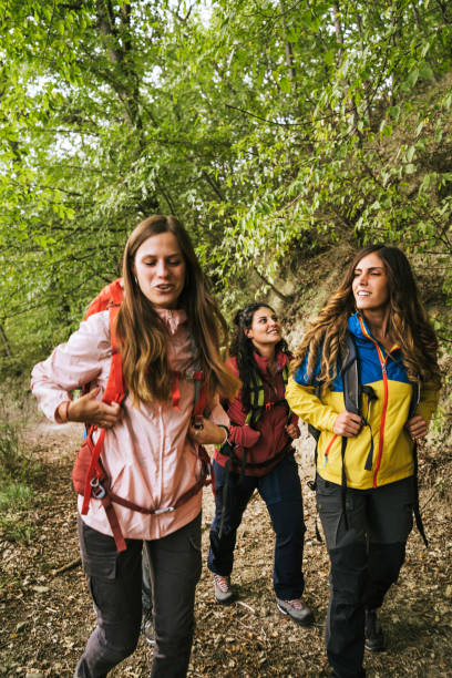 istock friends on the weekend doing a trekking 1578818087