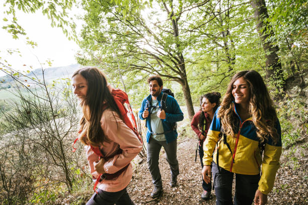 istock friends on the weekend doing a trekking 1578819111