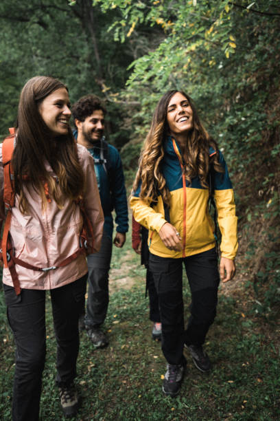 istock friends on the weekend doing a trekking 1578823202
