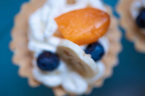 Tartlets with cream and fruits.