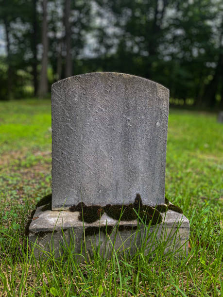 istock Tombstone Weathered Unreadable Old Cemetery 1578864456