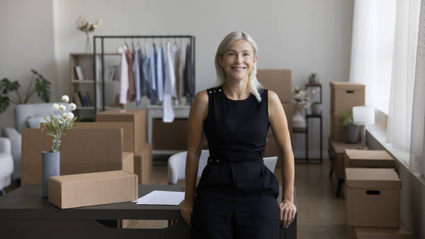 istock Successful happy small Internet shop owner posing at workplace 1578882431