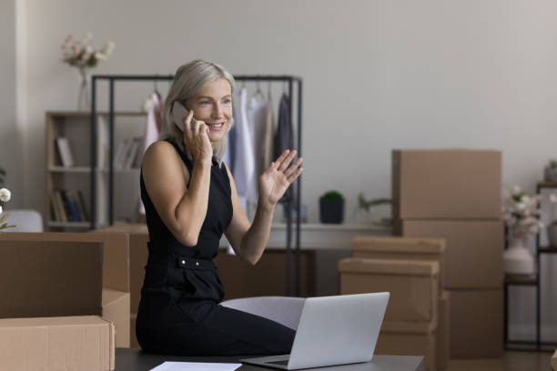 istock Positive middle aged internet shop owner working in storage space 1578885586