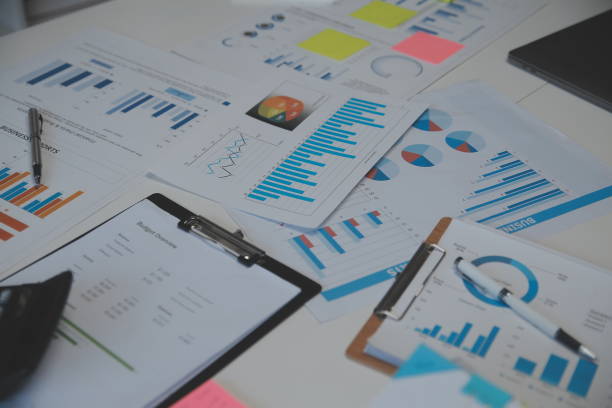 istock Business accounting concept, Business Man using calculator with computer laptop,pen, budget and loan paper in office. 1578909936