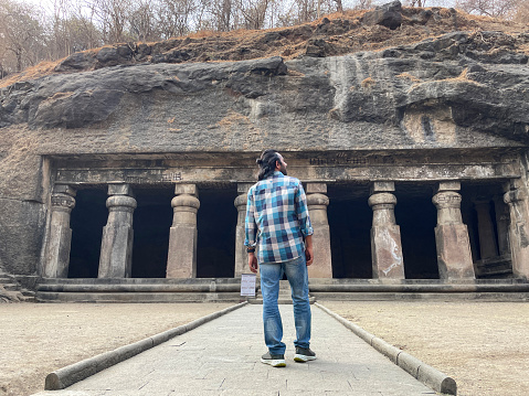 Stock photo showing close-up view of temple dedicated to the Hindu god Shiva hewn from basalt rock.