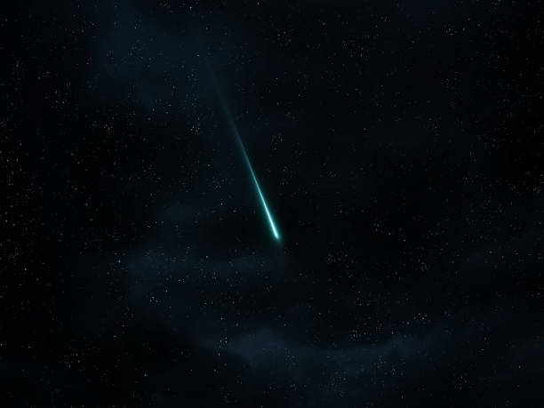 istock Bright green meteor among stars in the sky. 1579119557