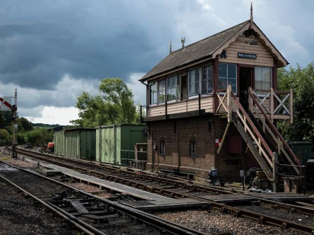 istock a building with a stairs leading to a platform near tracks 1579127206