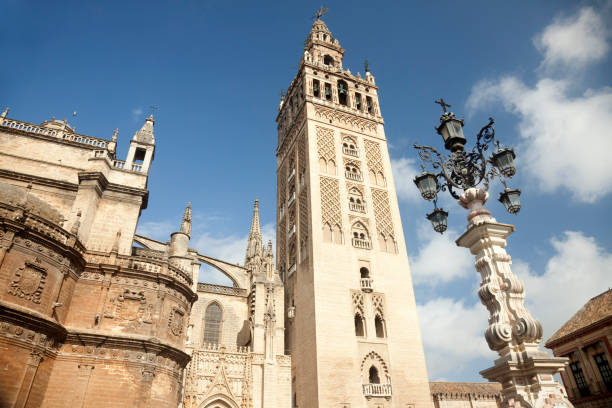 Low angle view of the most emblematic monuments in Seville, the Cathedral and La Giralda located in downtown