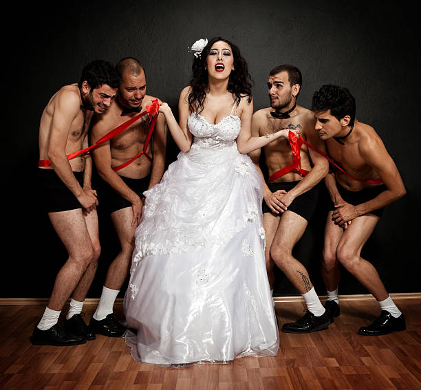 한 테크에서 4 grooms - female with group of males men women bizarre 뉴스 사진 이미지