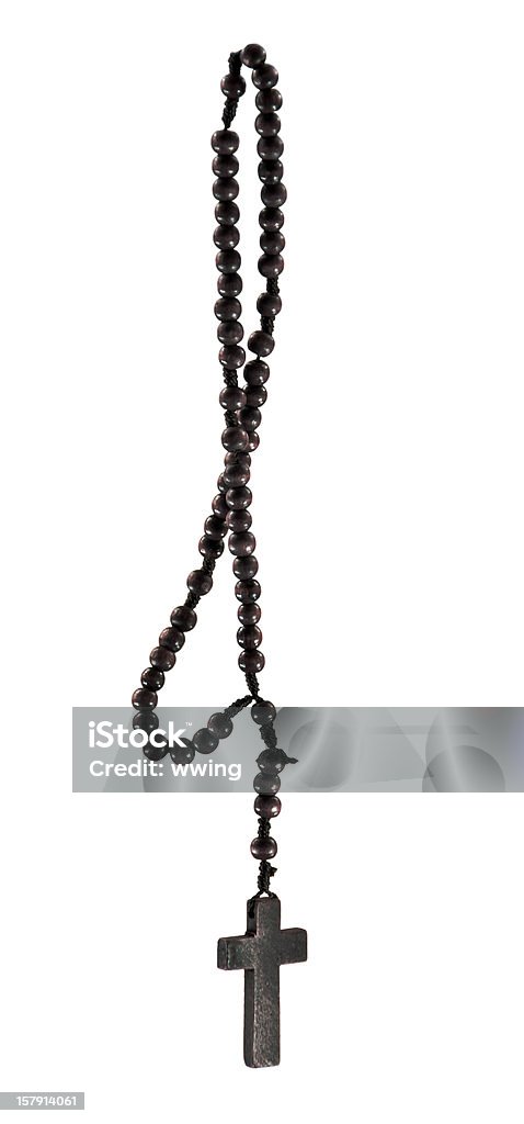 Rosary with clipping path A roughly made hand made wood rosary with clipping path. Rosary Beads Stock Photo
