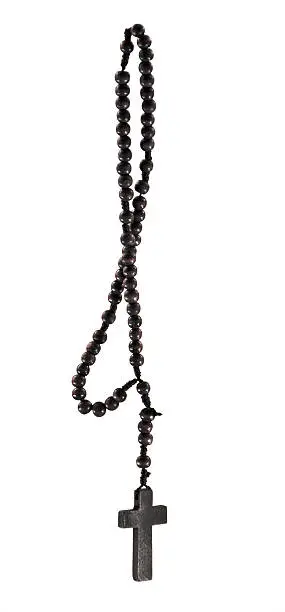 A roughly made hand made wood rosary with clipping path.