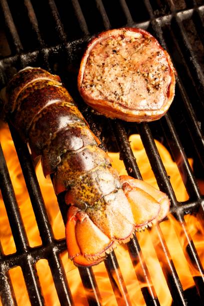 istock Lobster Tail & Filet Mignon on the grill 157914690