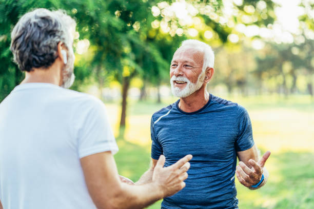 istock Senior friends resting after jogging 1579235817