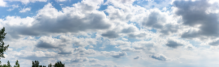 A view of a blue cloudy sky.