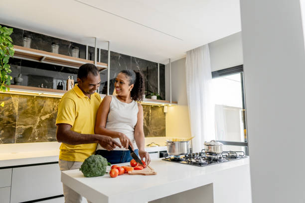 istock Mature couple cooking together 1579475246