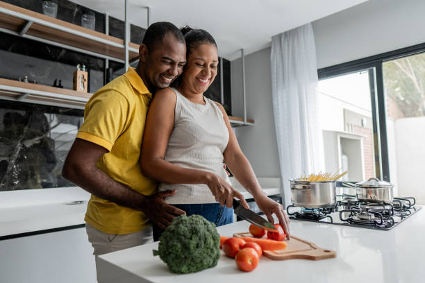 istock Mature couple cooking together 1579475247