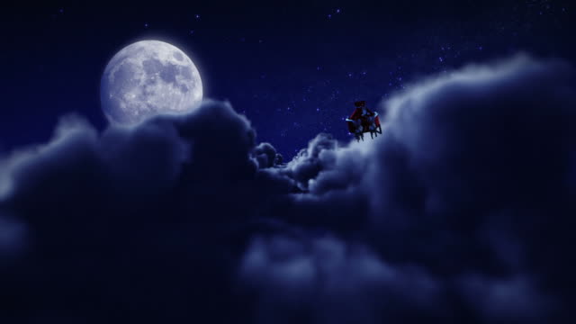 Santa flying over full moon.