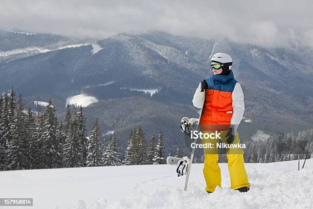 Female Snowboarder Against Sun And Sky Stock Photo - Download Image Now - 18-19 Years, Adult, Adults Only