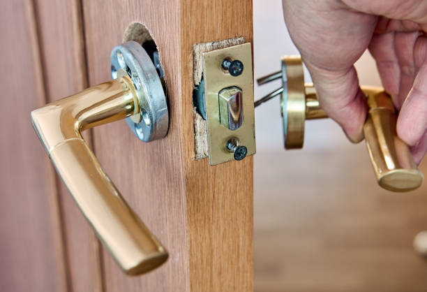 istock Assembling lever door handle with latch for an interior door. 1579593442