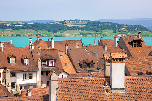 View of red tile rooftops of the Old Town in Murten, Switzerland
