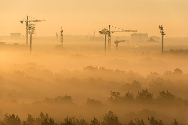 istock Cranes in the fog 157961330