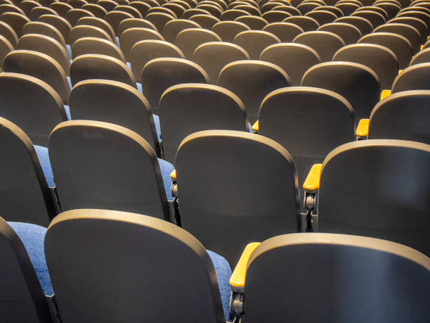istock Empty gray and blue theater, auditorium seats, chairs. 1579613702