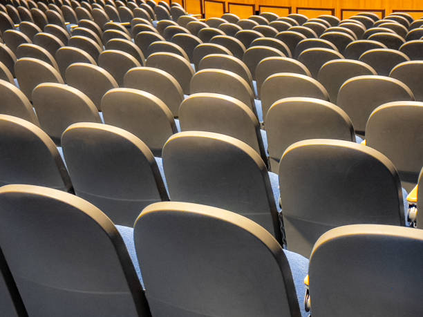 istock Empty gray and blue theater, auditorium seats, chairs. 1579613703