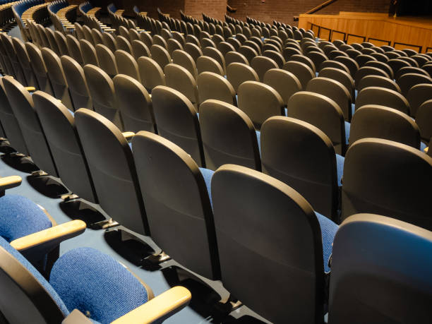 istock Empty gray and blue theater, auditorium seats, chairs. 1579615892