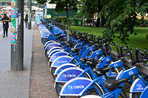 Oslo, Norway, July 7, 2023 - Oslo City Bike Station from City Bike Partner OBOS near the Central Station.