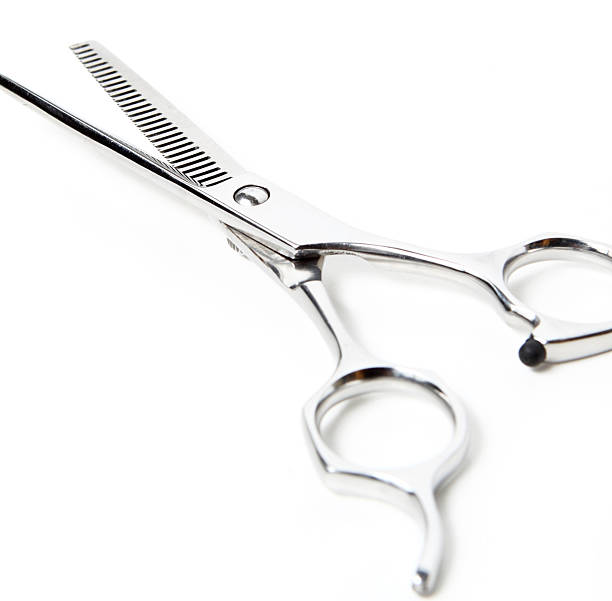 istock Professional Haircutting Scissors. Studio isolation on white. 157962066