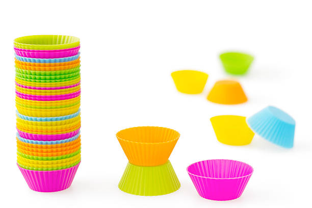 istock Pink, orange, green, blue and yellow silicone baking cups 157964502