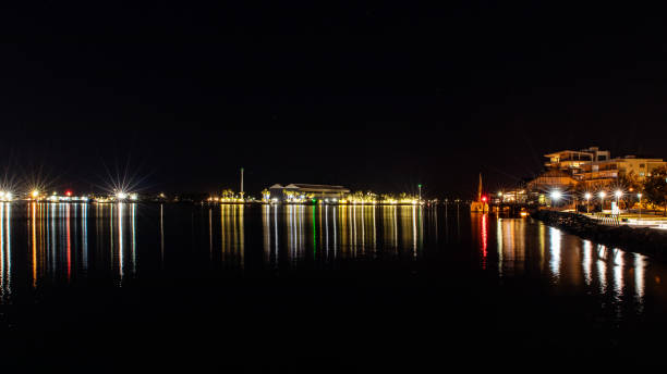 istock Calm port night following stars. 1579682351