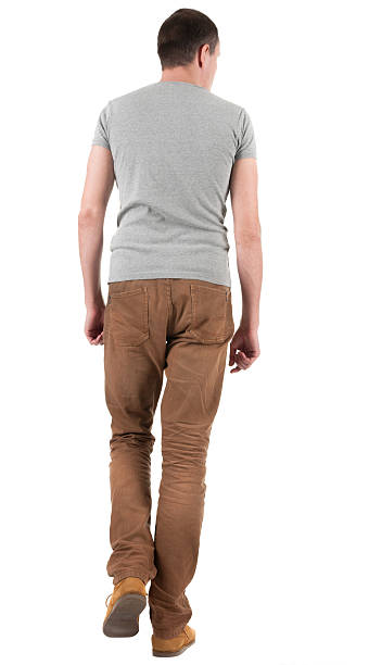 istock Back view of going  handsome man in jeans and shirt. 157969793