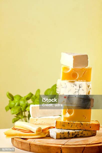 Pile Of Cheese Many Various Types Stock Photo - Download Image Now - Appetizer, Basil, Brie