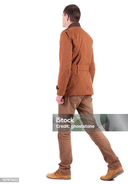 Vista Posterior De Poca Hombre Atractivo En Pantalones Y Camisa Foto de stock y más banco de imágenes de Vista posterior