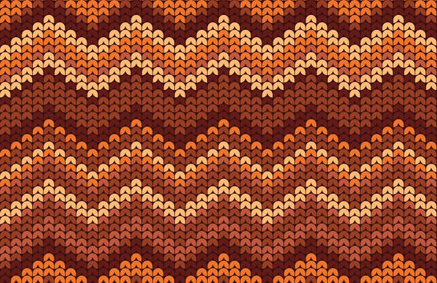 Seamless repeating tileable autumn fall knitted zigzag sweater background pattern.