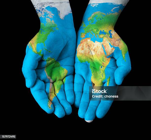 World Map Painted On Hands Stock Photo - Download Image Now - Geographical Locations, Horizontal, Human Body Part